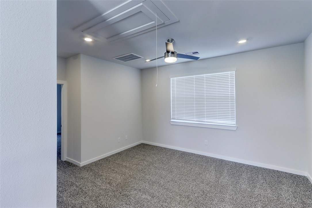 760 Double Mountain Road College Station, TX 77845 - Photo 15 of 26 a view of an empty room with a window