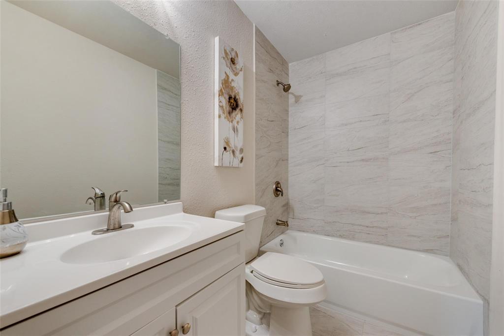 506 North Fm 156 Ponder, TX 76259 - Photo 11 of 23 a bathroom with a sink toilet and shower