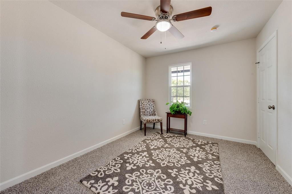 506 North Fm 156 Ponder, TX 76259 - Photo 19 of 23 wooden floor in a hall with a window