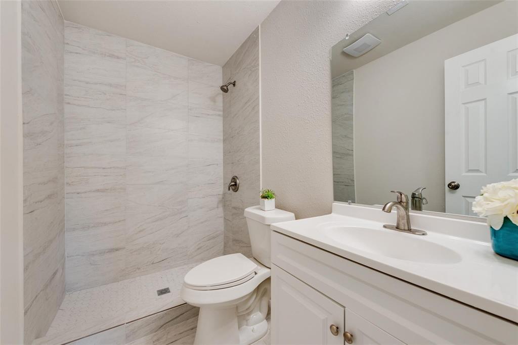 506 North Fm 156 Ponder, TX 76259 - Photo 20 of 23 a bathroom with a sink a toilet and shower