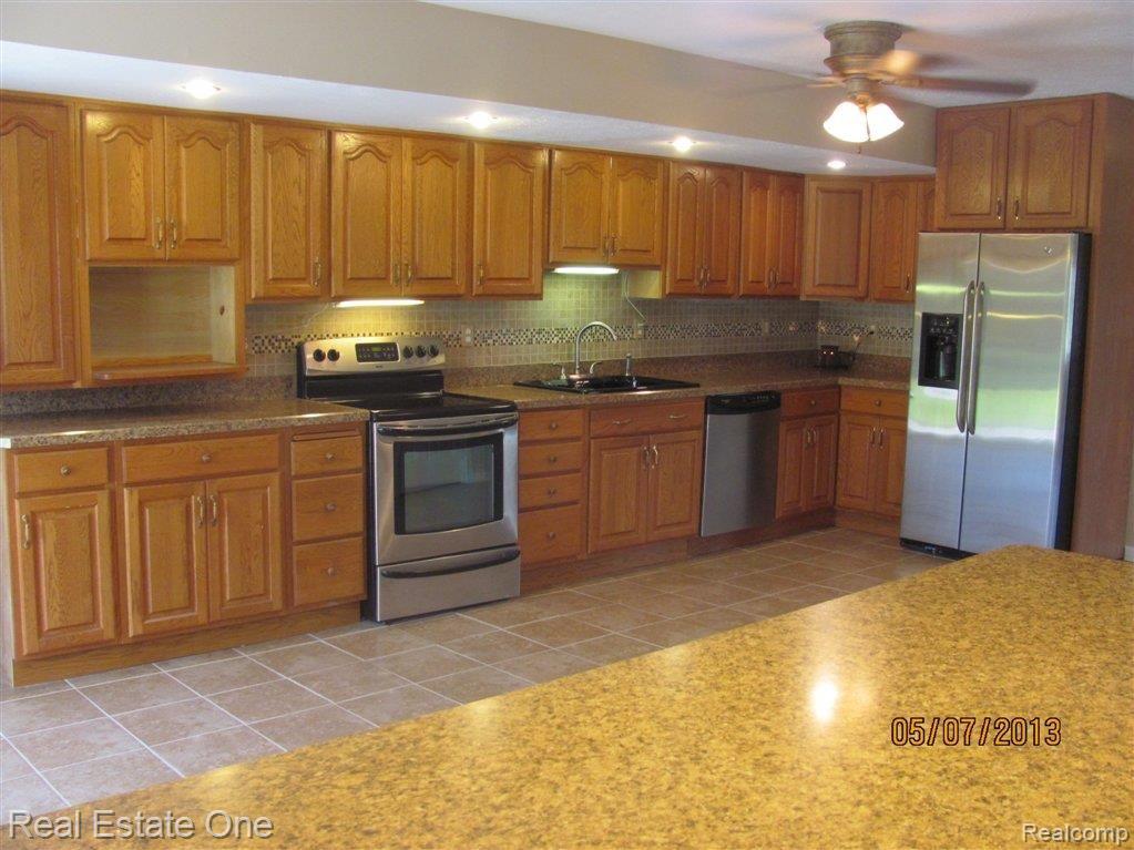 Looking at kitchen from dining r