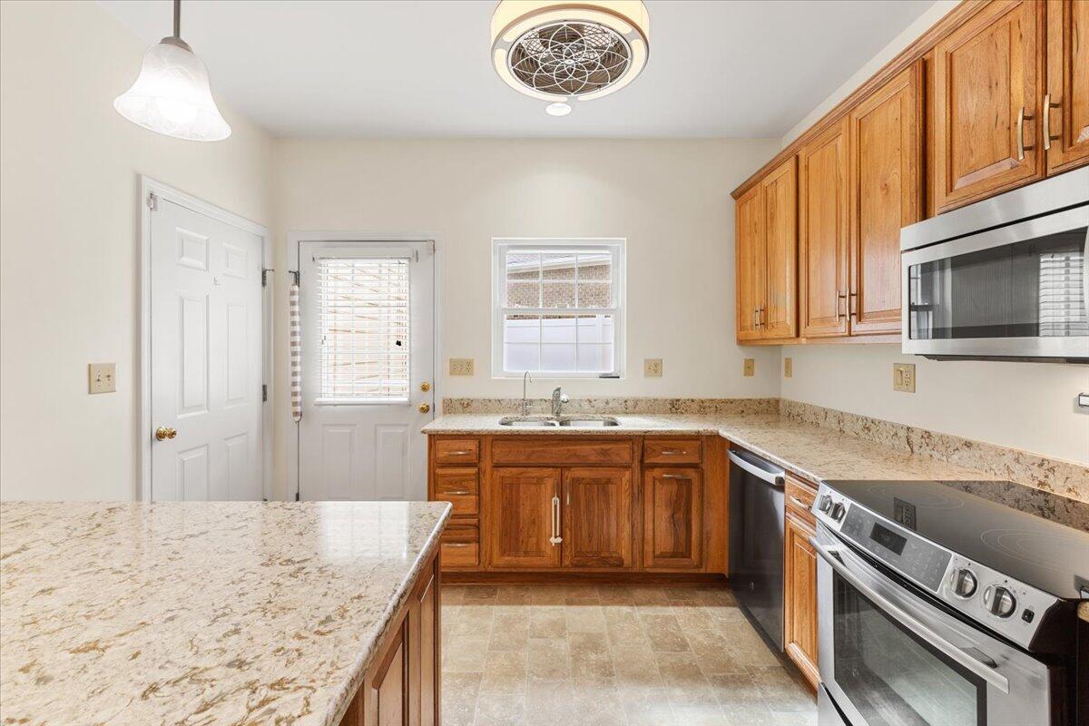 3409 Laurel Circle Roanoke, VA 24018 - Photo 11 of 34 a kitchen with a sink stove and microwave