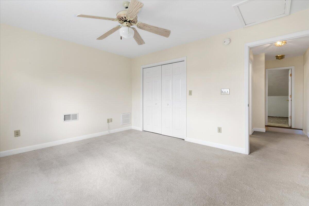3409 Laurel Circle Roanoke, VA 24018 - Photo 14 of 34 an empty room with chandelier fan