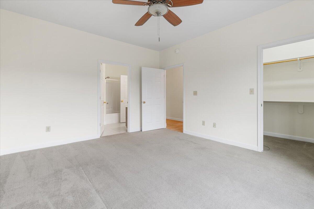 3409 Laurel Circle Roanoke, VA 24018 - Photo 24 of 34 an empty room with a ceiling fan and entryway