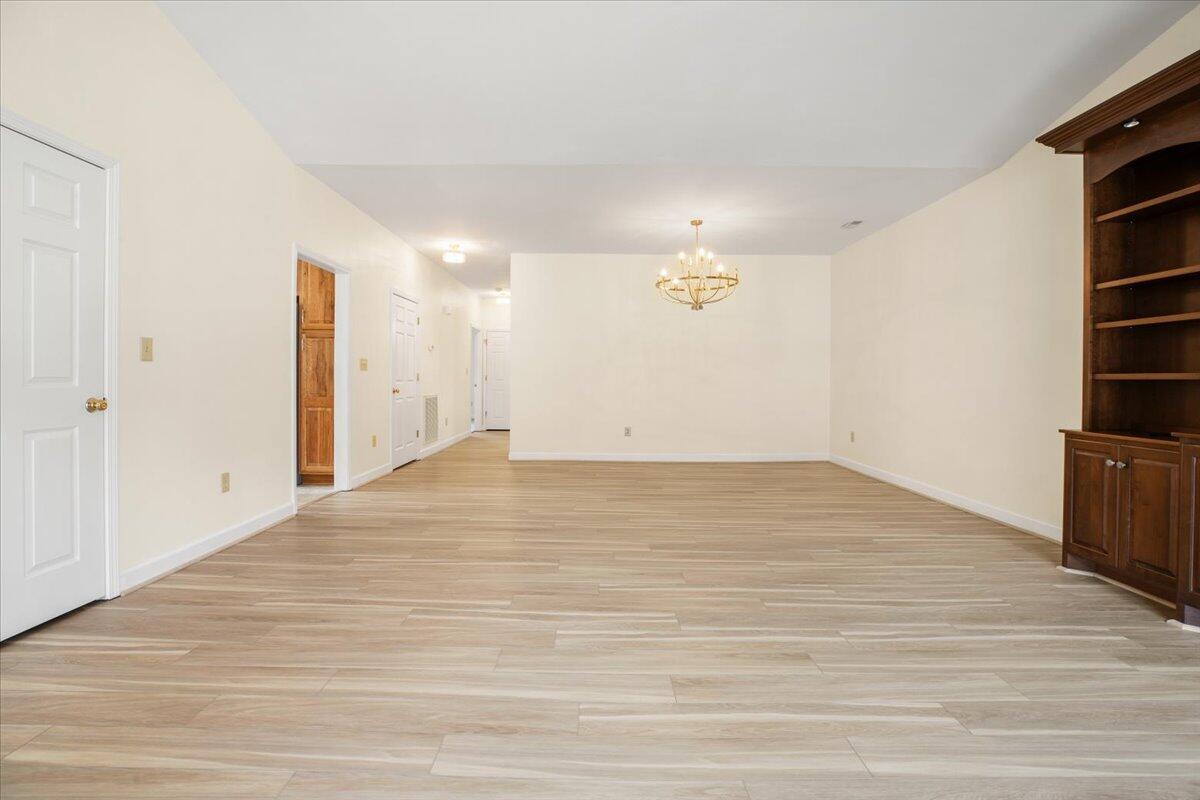 3409 Laurel Circle Roanoke, VA 24018 - Photo 6 of 34 a view of empty room with wooden floor and fan
