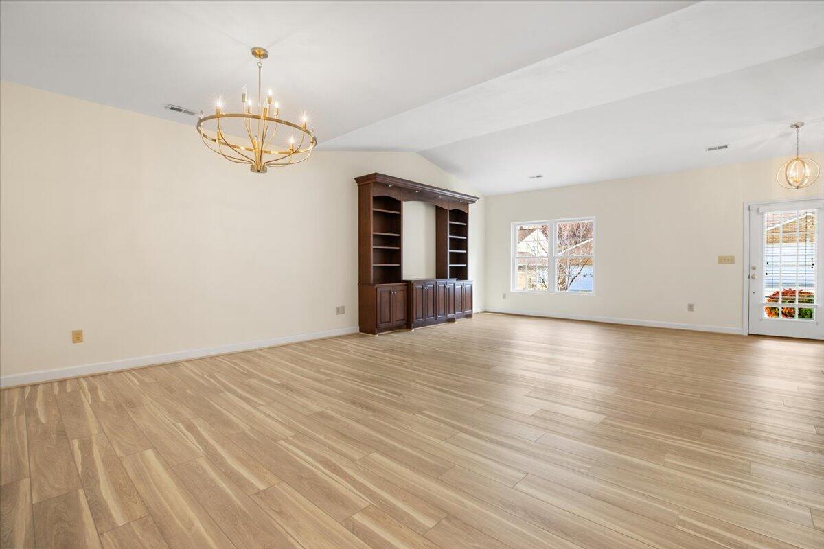 3409 Laurel Circle Roanoke, VA 24018 - Photo 8 of 34 a view of empty room with wooden floor and window