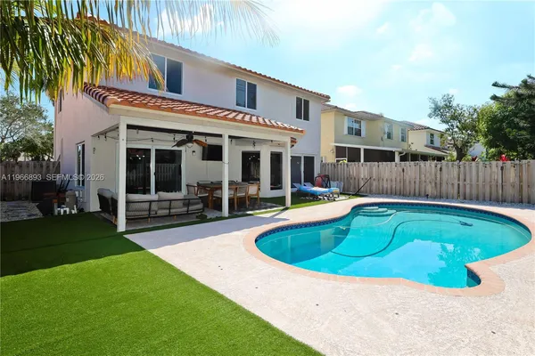 a view of outdoor space yard swimming pool and patio