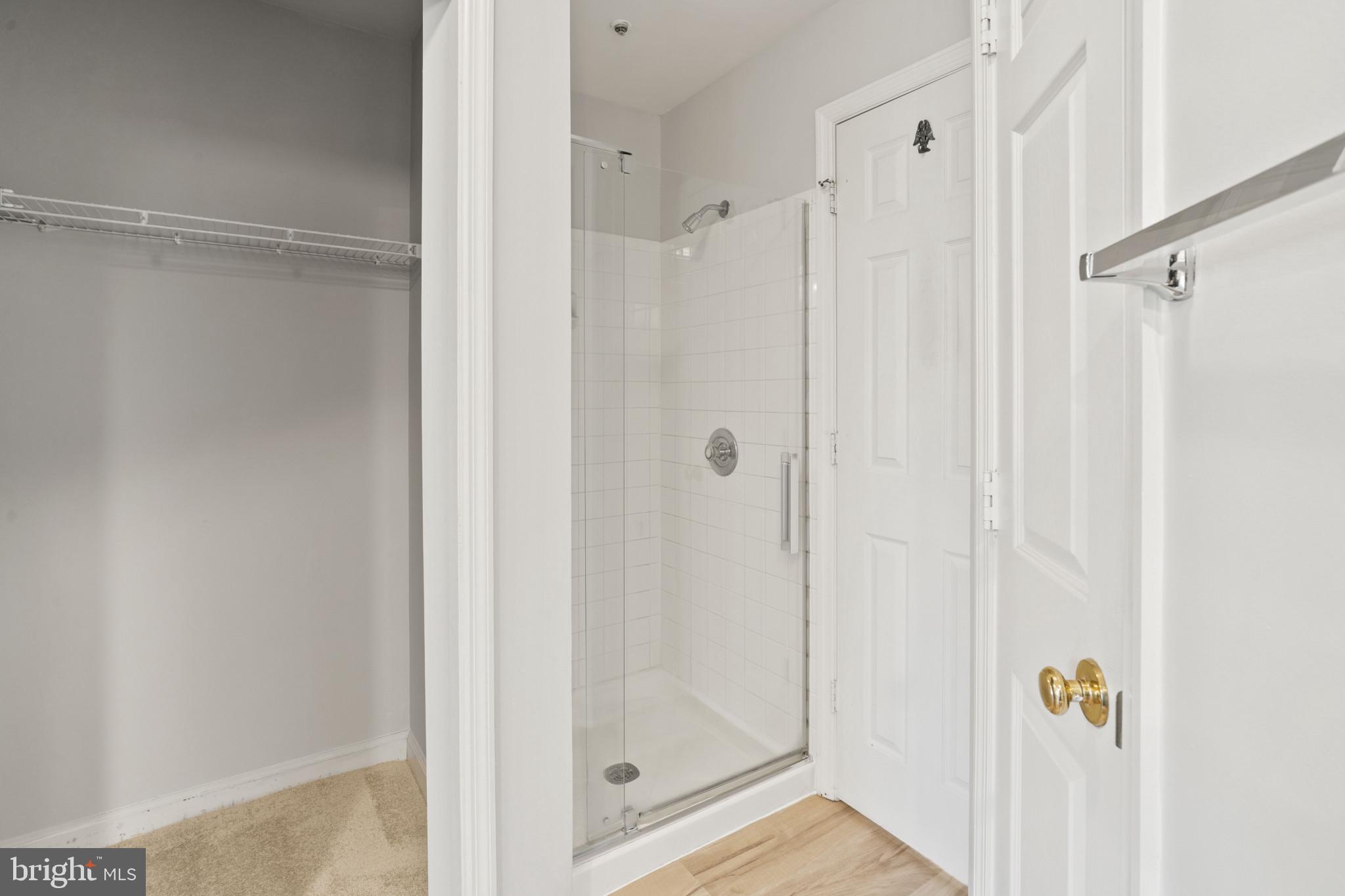 6832 Hayley Ridge Way, Unit D Baltimore, MD 21209 - Photo 16 of 33 a bathroom with a shower