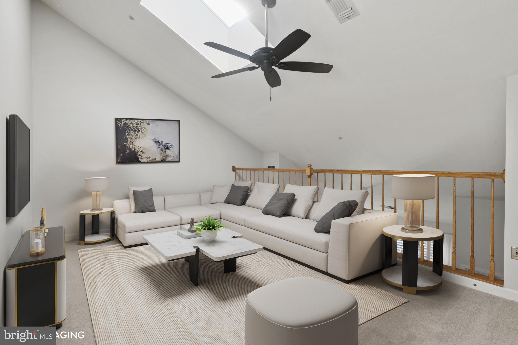 6832 Hayley Ridge Way, Unit D Baltimore, MD 21209 - Photo 24 of 33 a living room with furniture and a flat screen tv