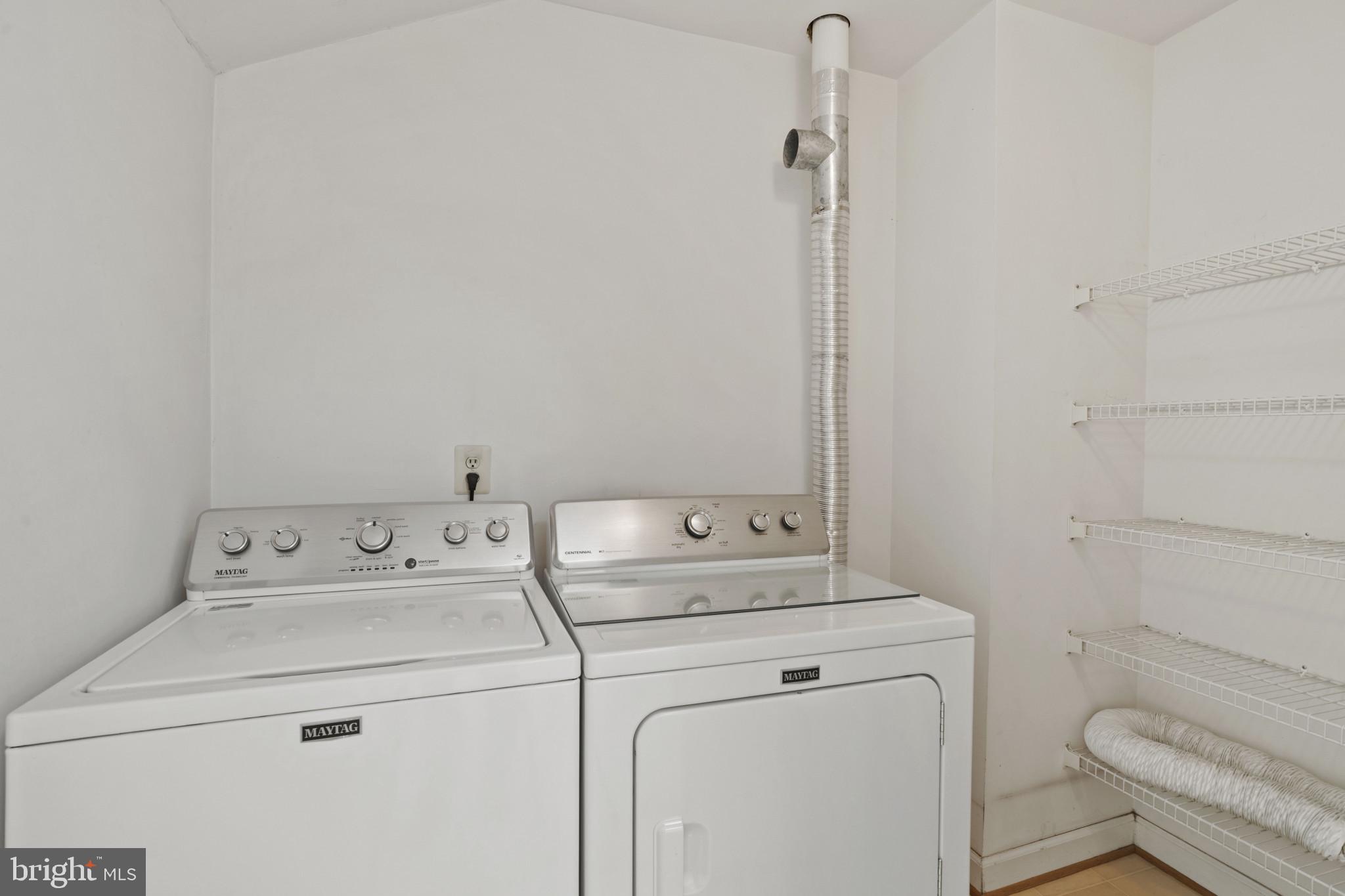 6832 Hayley Ridge Way, Unit D Baltimore, MD 21209 - Photo 27 of 33 a utility room with dryer and washer