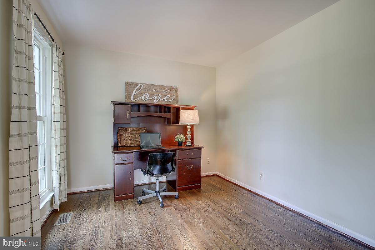 8167 Barnwood Road Manassas, VA 20110 - Photo 3 of 50 Refinished Hardwood in Office