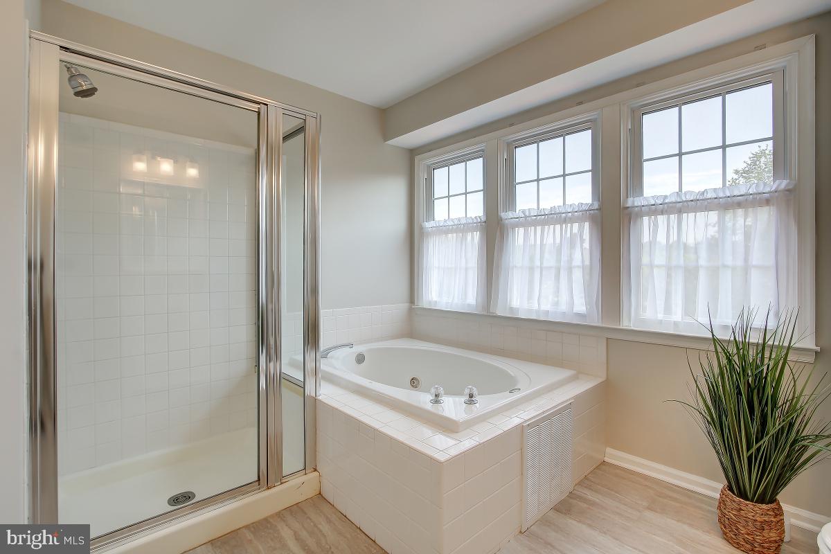 8167 Barnwood Road Manassas, VA 20110 - Photo 24 of 50 New Tile Floor and Updated Lighting