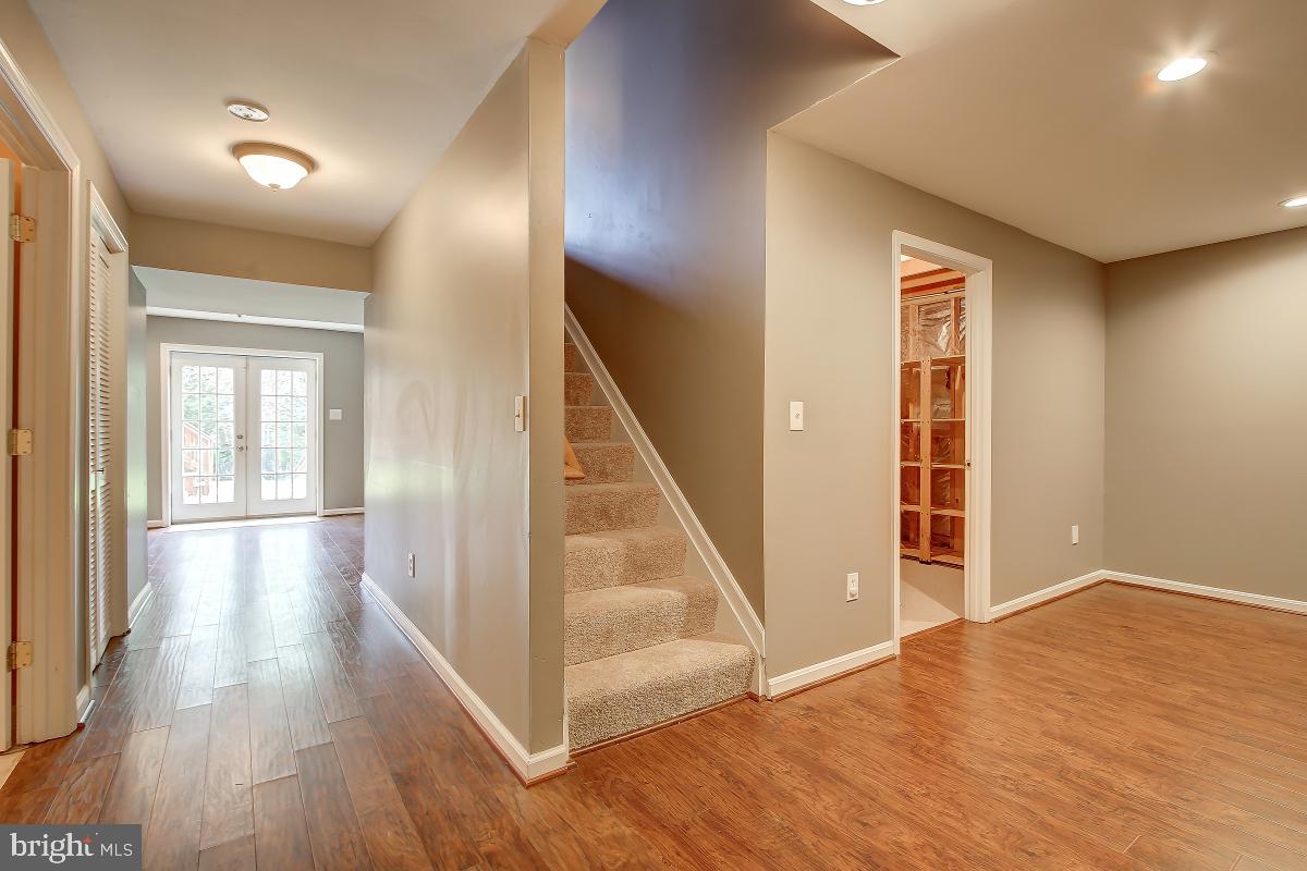 8167 Barnwood Road Manassas, VA 20110 - Photo 30 of 50 Lower Level with New Laminate, Walk Out Basement