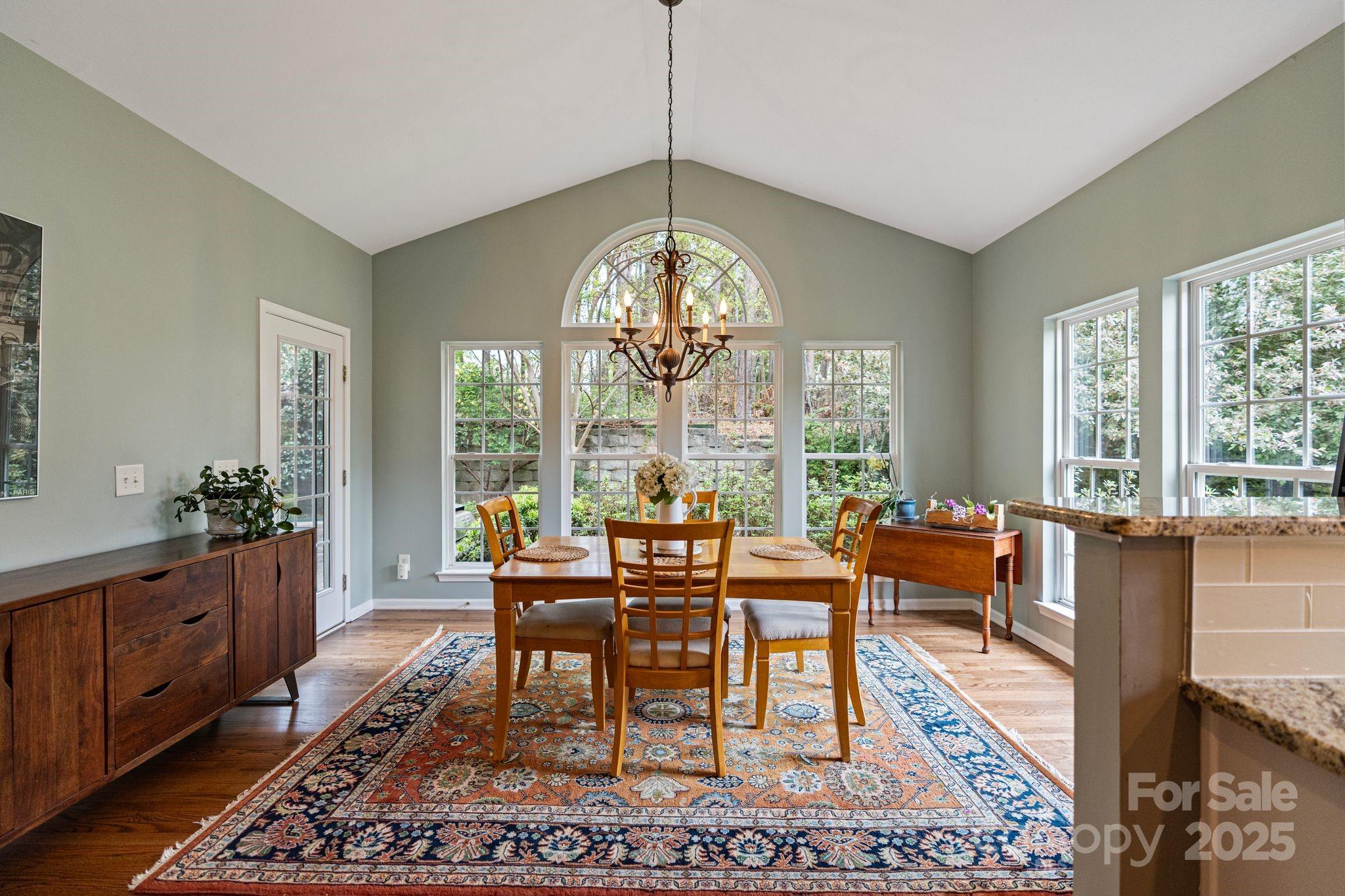 1039 Sharon Lee Avenue Fort Mill, SC 29708 - Photo 20 of 46 a view of a dining room with furniture window and wooden floor