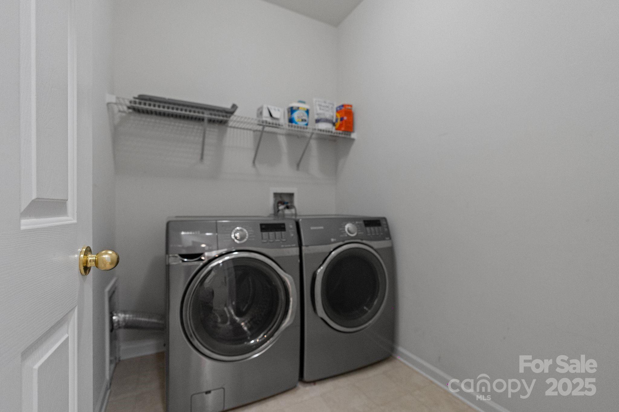 1039 Sharon Lee Avenue Fort Mill, SC 29708 - Photo 24 of 46 a utility room with dryer and washer