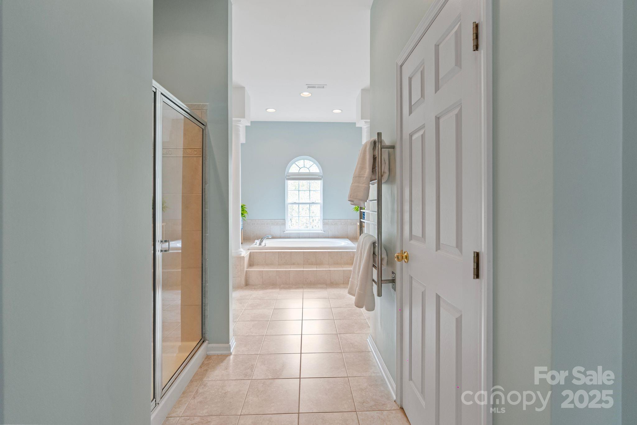 1039 Sharon Lee Avenue Fort Mill, SC 29708 - Photo 36 of 46 a view of a hallway with wooden floor and a living room