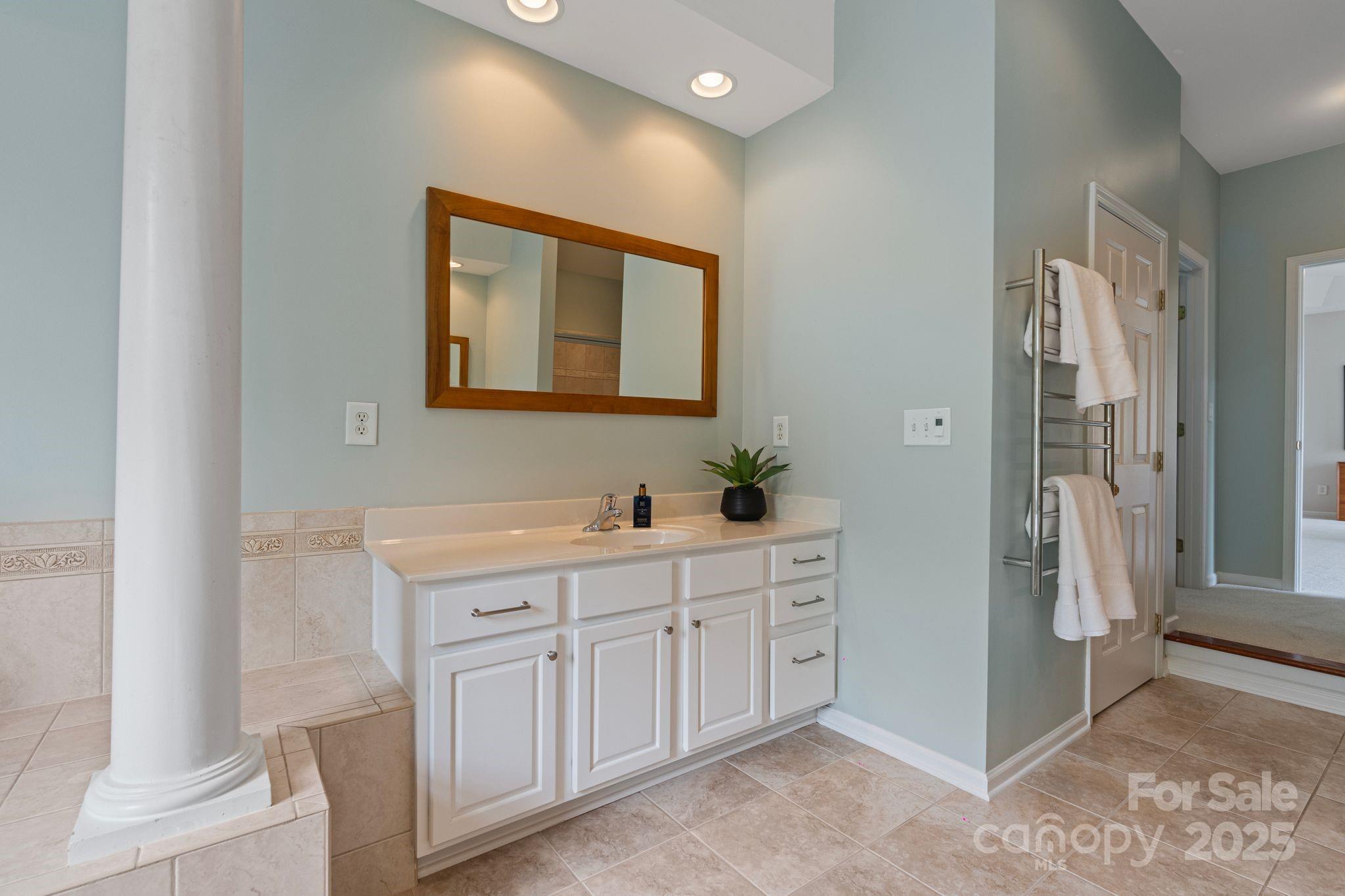 1039 Sharon Lee Avenue Fort Mill, SC 29708 - Photo 39 of 46 a bathroom with a double vanity sink and a mirror