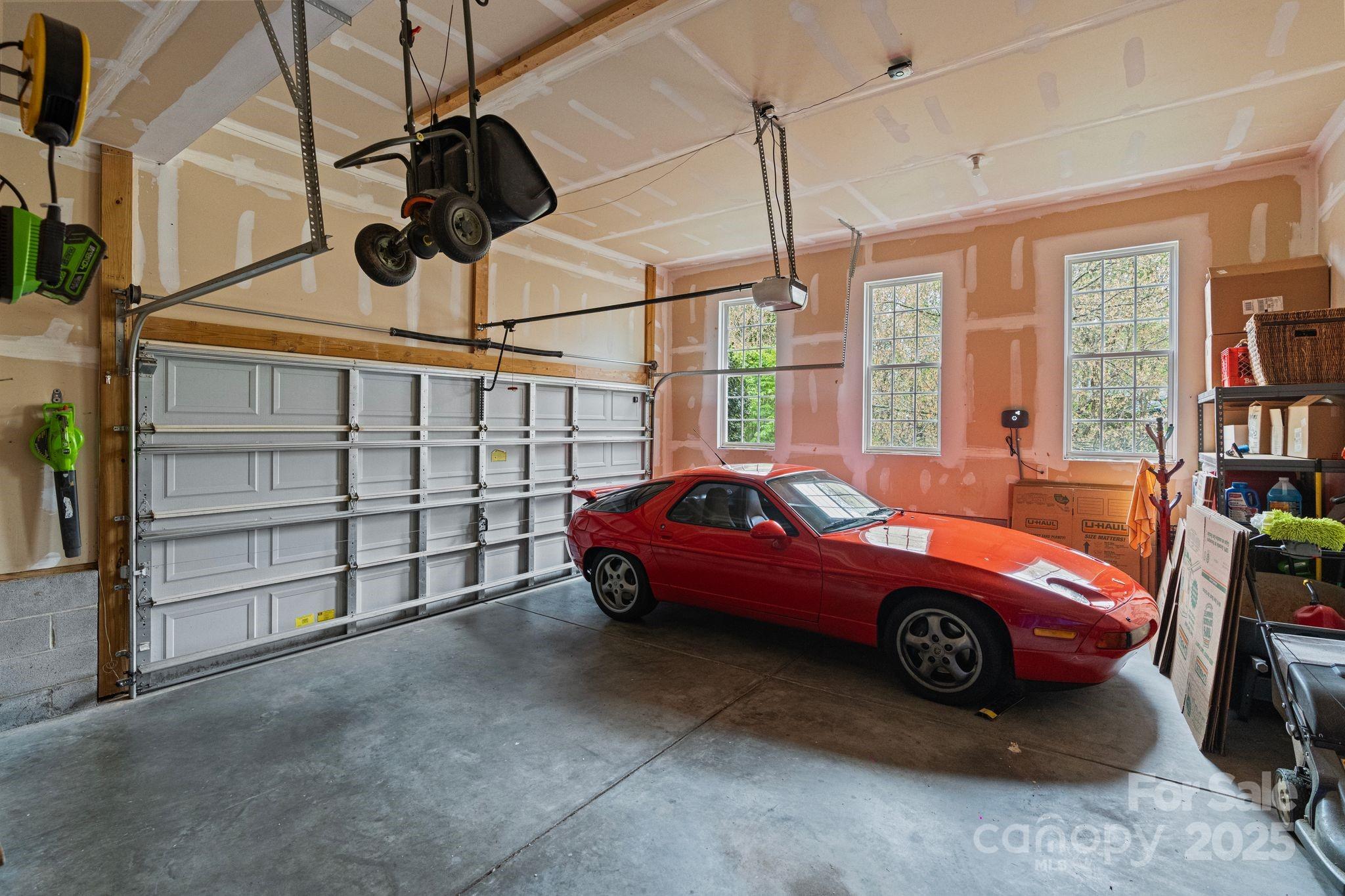 1039 Sharon Lee Avenue Fort Mill, SC 29708 - Photo 41 of 46 a car parked in a garage