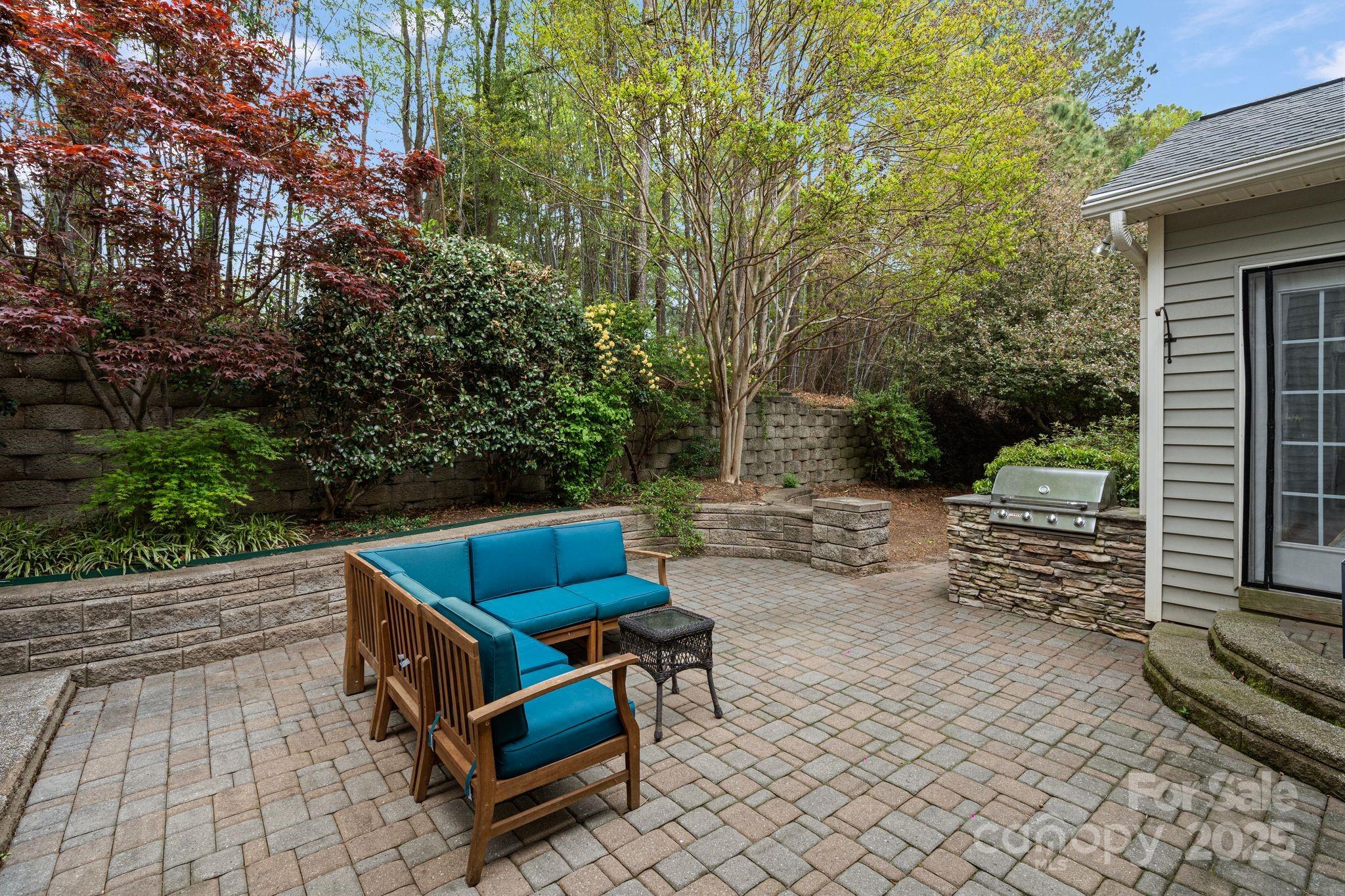 1039 Sharon Lee Avenue Fort Mill, SC 29708 - Photo 43 of 46 a backyard of a house with outdoor seating
