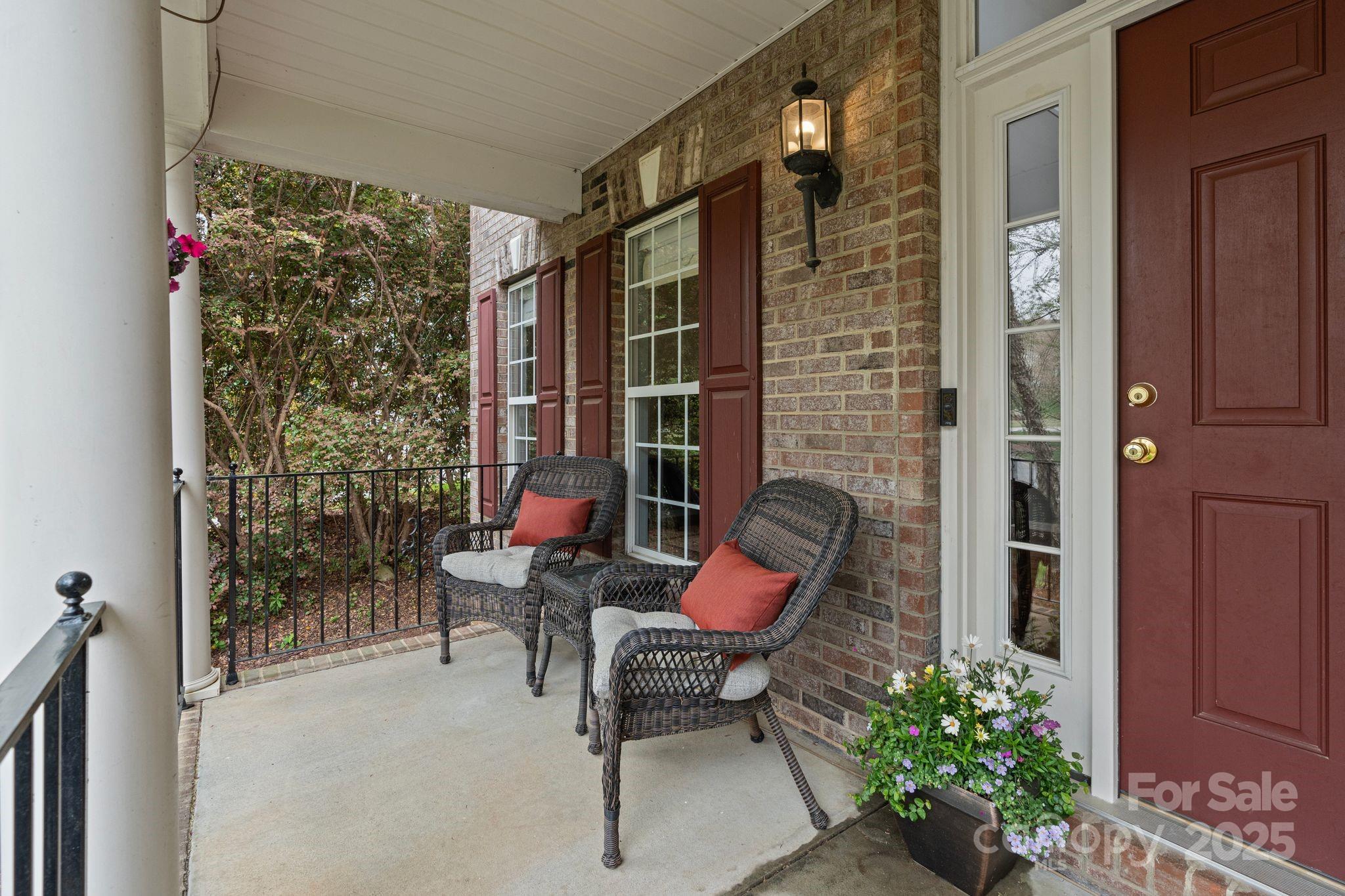 1039 Sharon Lee Avenue Fort Mill, SC 29708 - Photo 5 of 46 a patio with table and chairs and potted plants