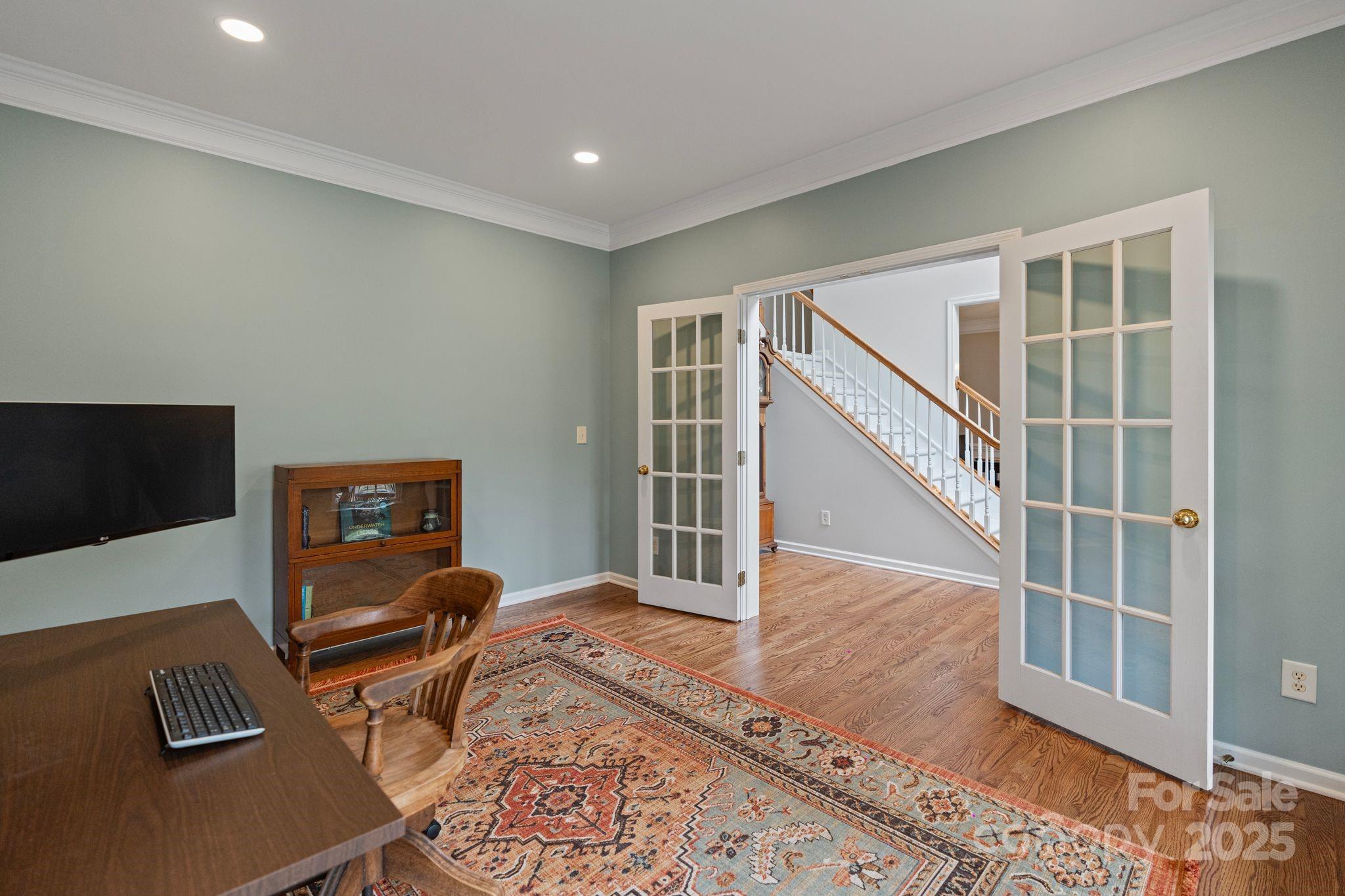 1039 Sharon Lee Avenue Fort Mill, SC 29708 - Photo 8 of 46 a living room with furniture and a flat screen tv
