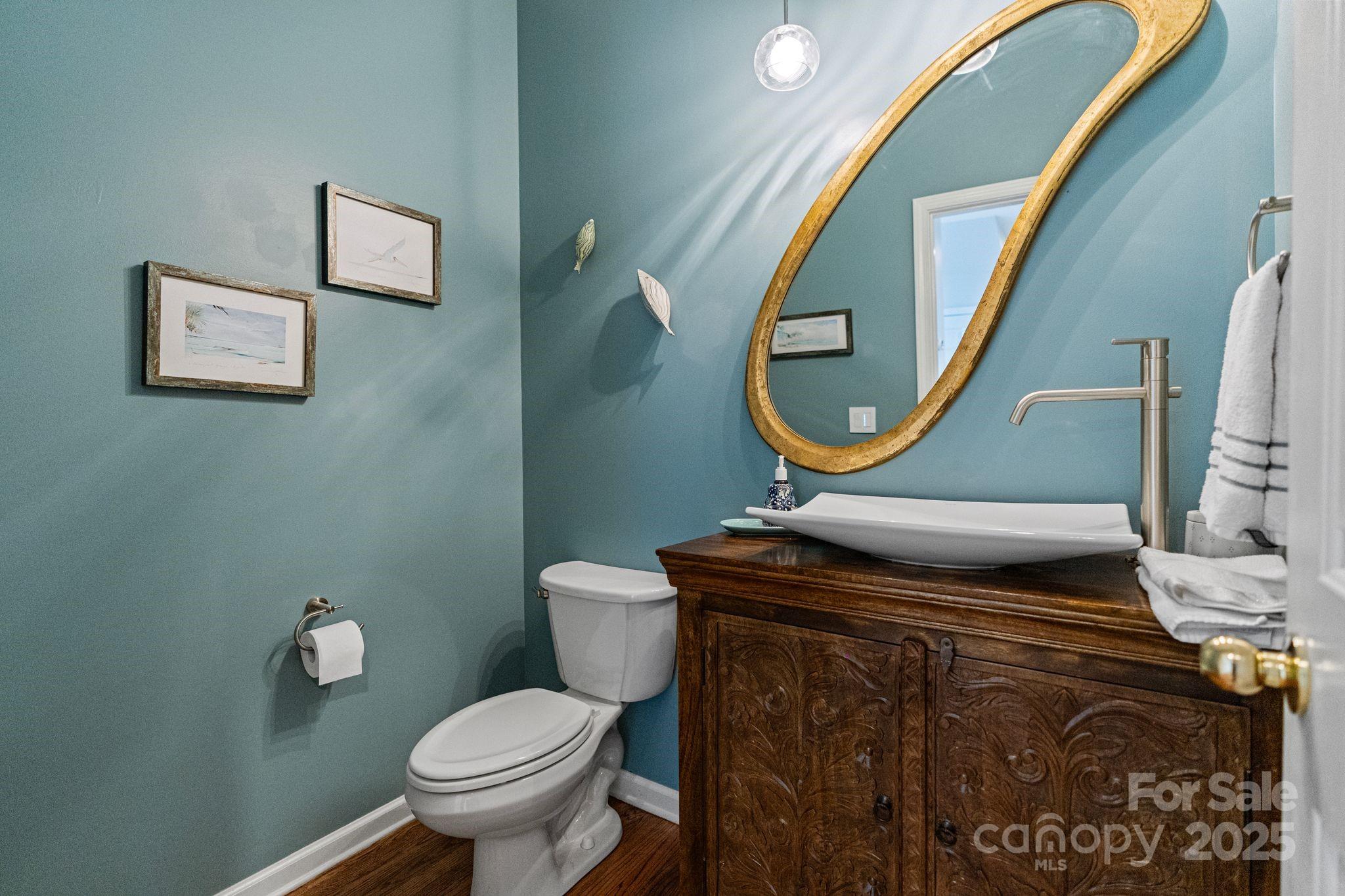 1039 Sharon Lee Avenue Fort Mill, SC 29708 - Photo 9 of 46 a bathroom with a toilet sink and mirror