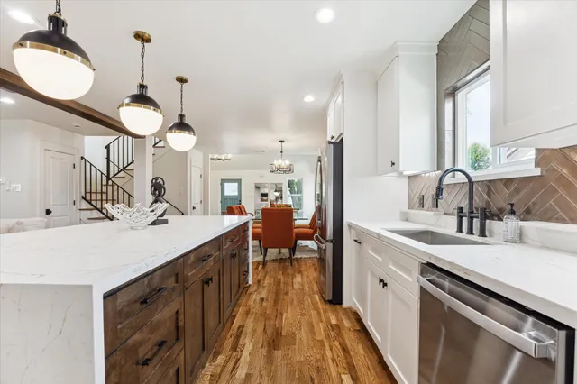a very nice looking kitchen with a sink