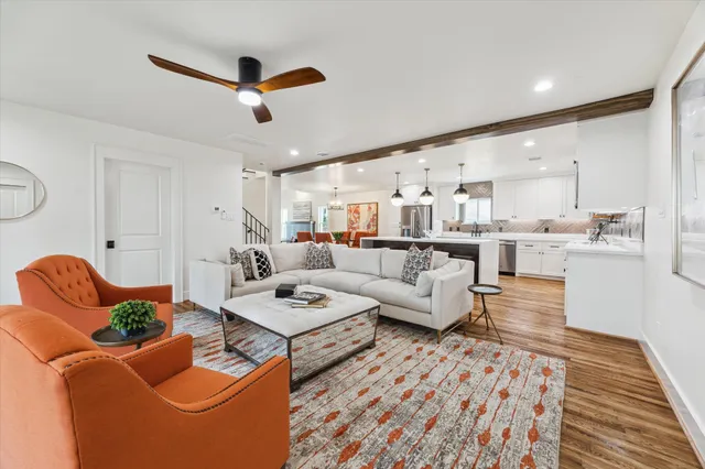 a living room with furniture and a rug