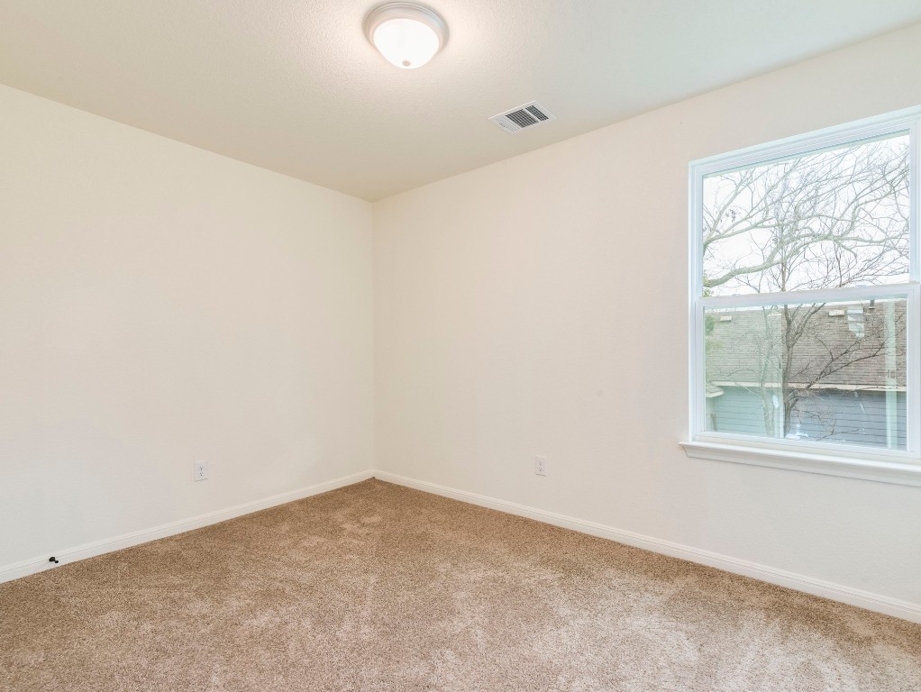 2002 West 2nd Street, Unit 902 Taylor, TX 76574 - Photo 13 of 18 an empty room with a window