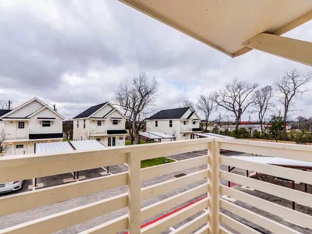 a view of a living room and entryway