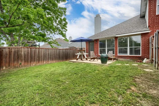 a garden view with a seating space
