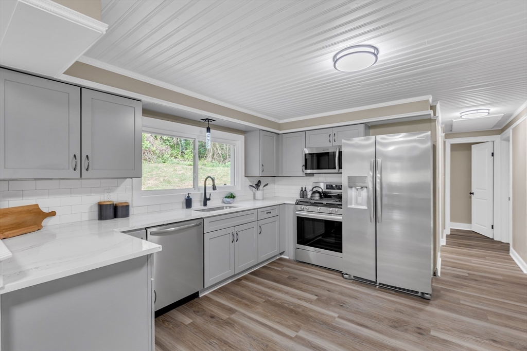 57 Stafford Road Monson, MA 01057 - Photo 6 of 26 a kitchen with a sink stainless steel appliances and window