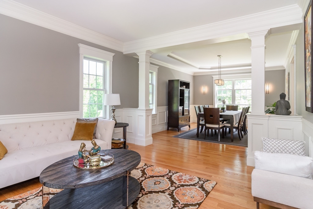 2 Hunters Lane Natick, MA 01760 - Photo 14 of 40 a living room with furniture and wooden floor