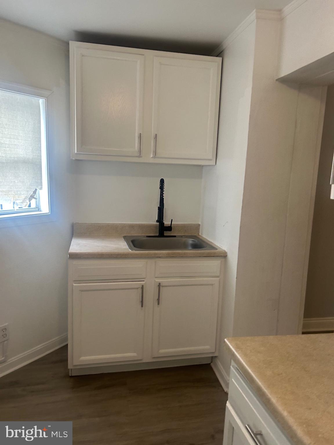 2136 North Fulton Avenue, Unit 3 Baltimore, MD 21217 - Photo 4 of 8 a view of washer and dryer