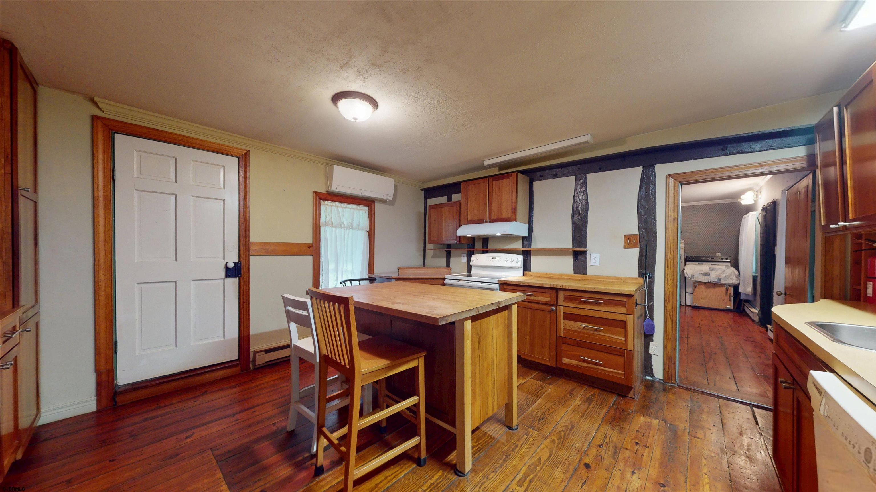 216 Old New York Road Port Republic, NJ 08241 - Photo 11 of 70 a open kitchen with stainless steel appliances granite countertop a stove and a refrigerator