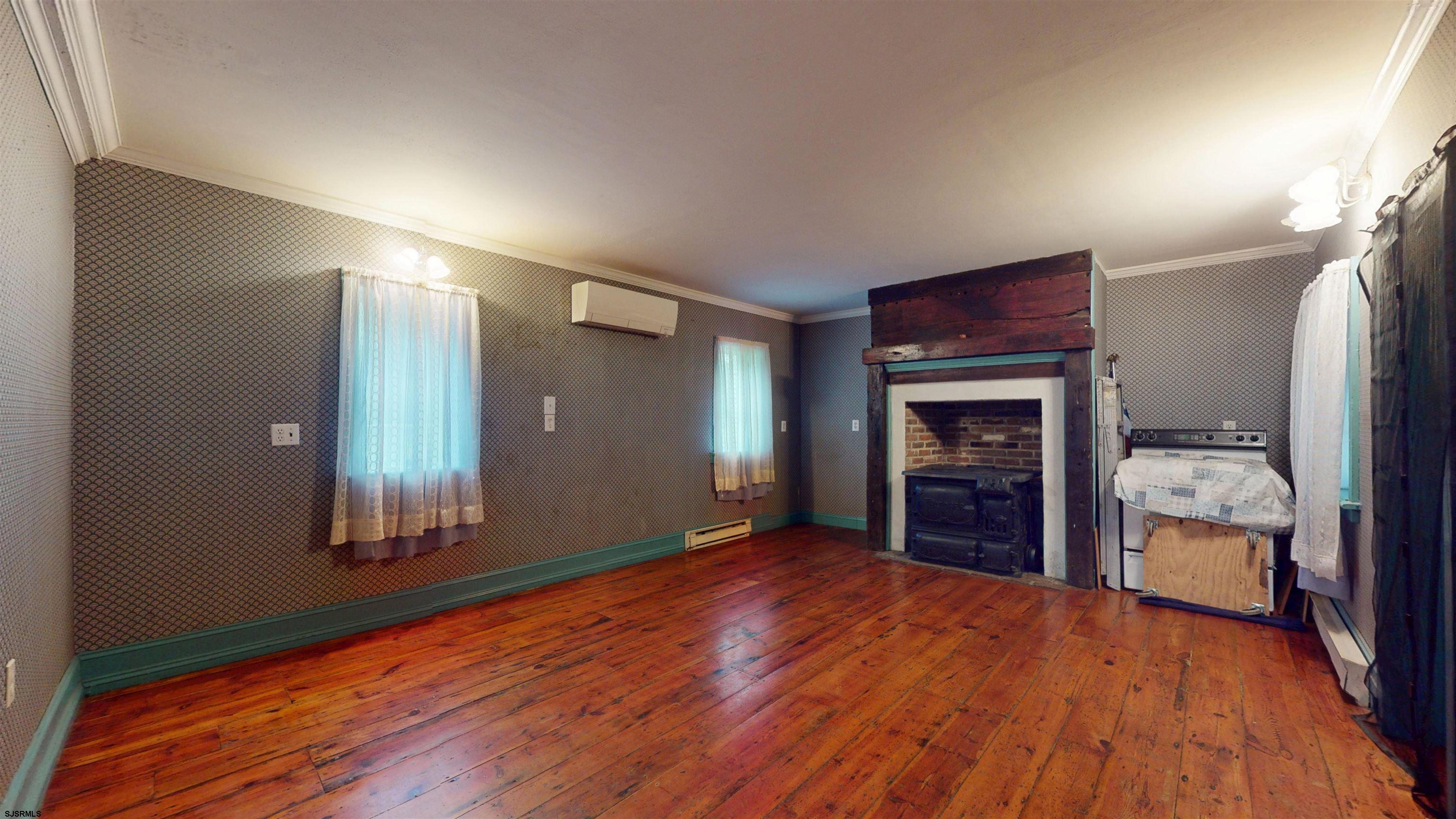 216 Old New York Road Port Republic, NJ 08241 - Photo 21 of 70 a view of a livingroom with a fireplace