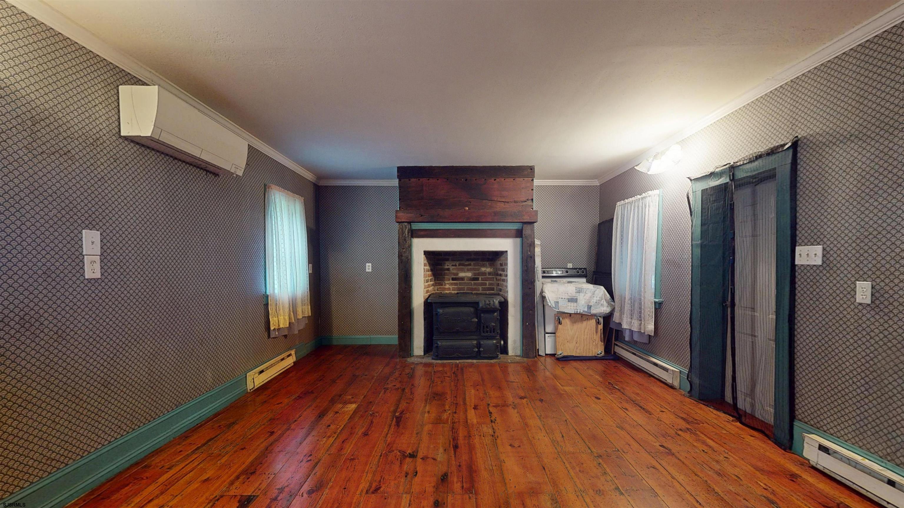 216 Old New York Road Port Republic, NJ 08241 - Photo 22 of 70 a view of a livingroom with a fireplace