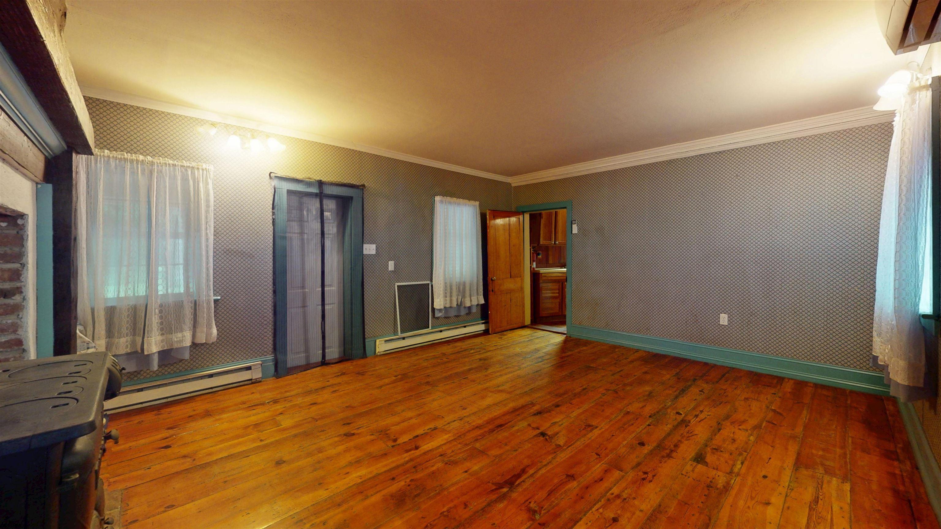 216 Old New York Road Port Republic, NJ 08241 - Photo 23 of 70 a view of an empty room with wooden floor