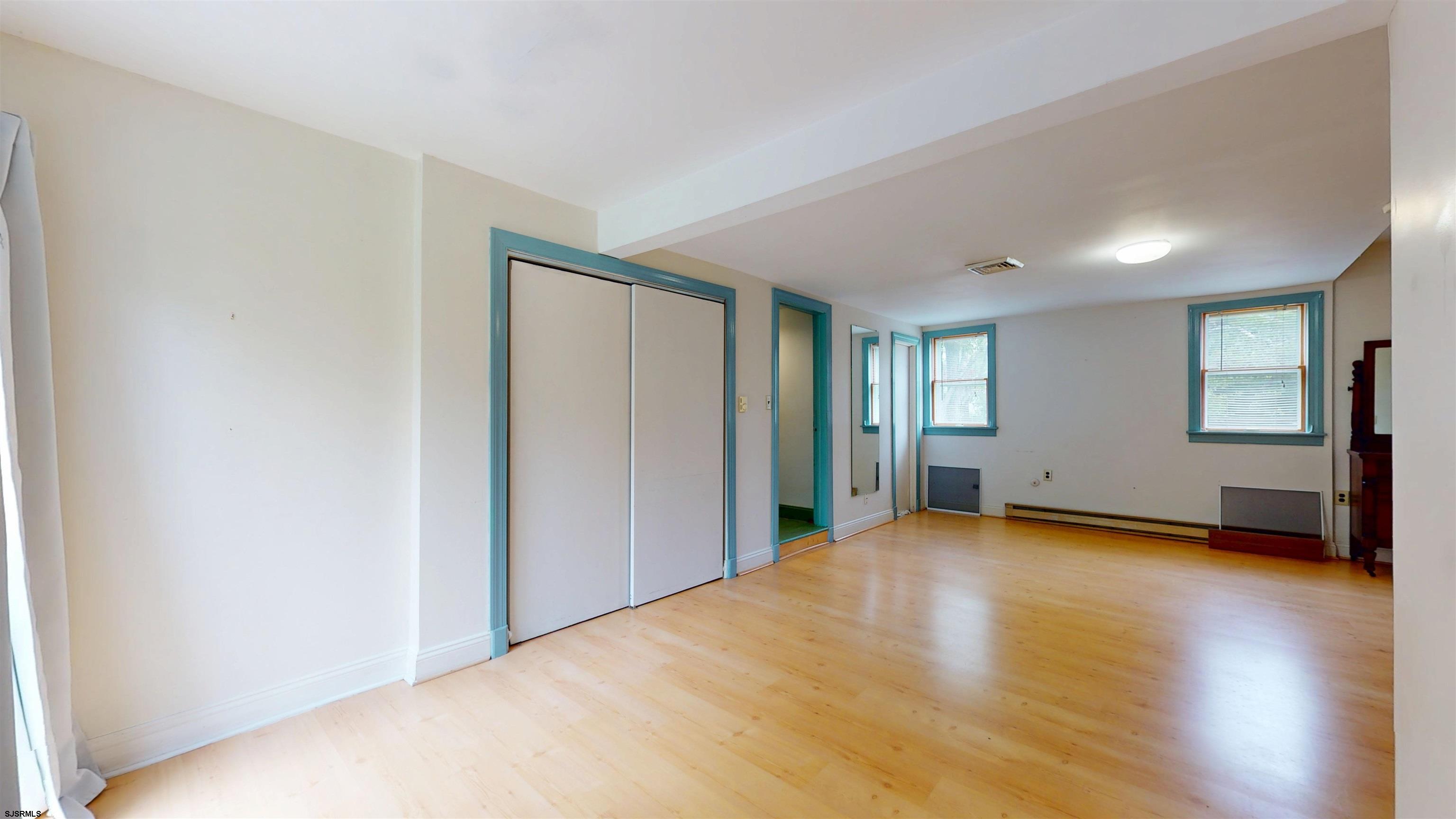 216 Old New York Road Port Republic, NJ 08241 - Photo 26 of 70 a view of an empty room with window and wooden floor