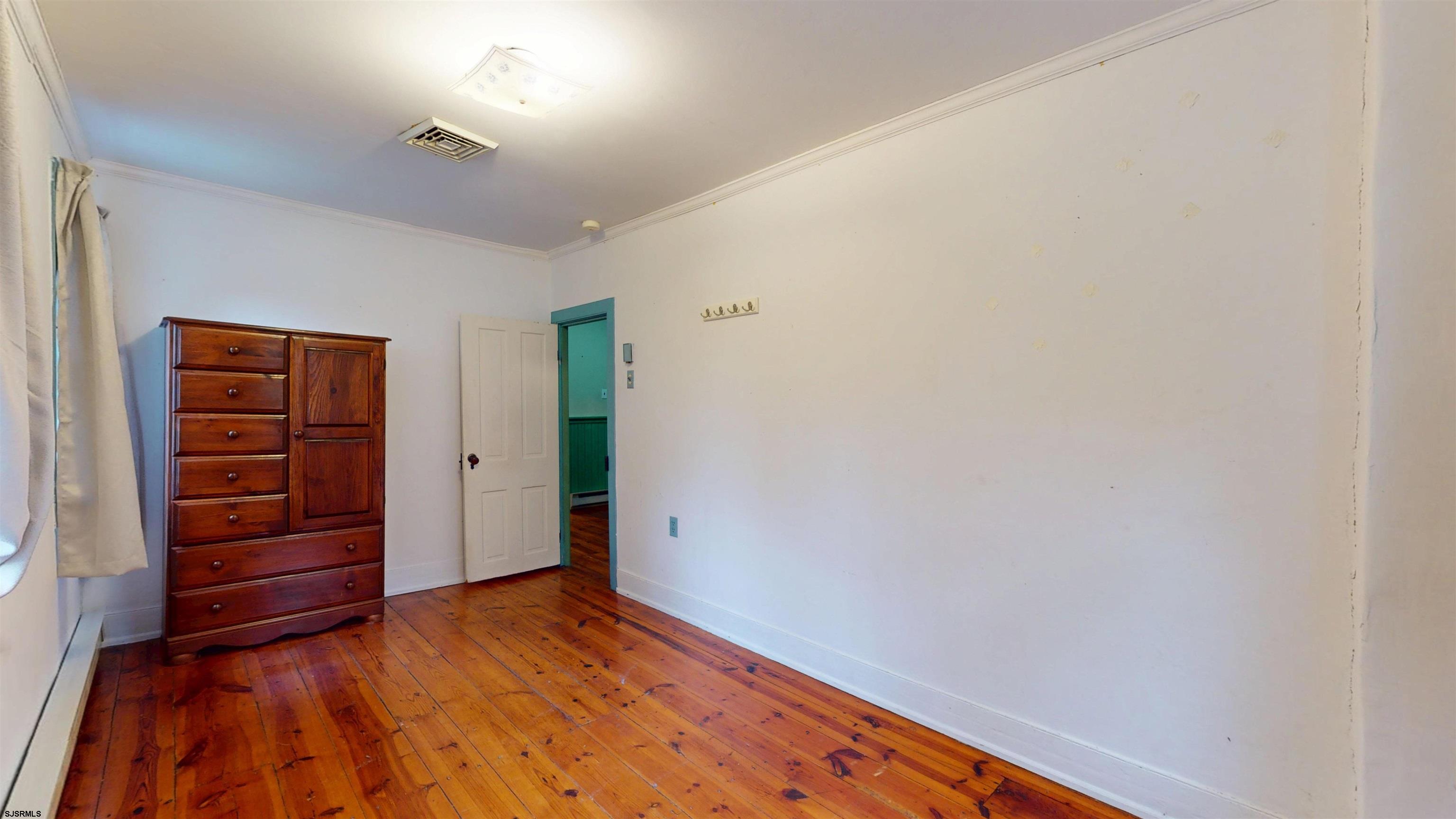 216 Old New York Road Port Republic, NJ 08241 - Photo 32 of 70 a view of room with wooden floor and closet