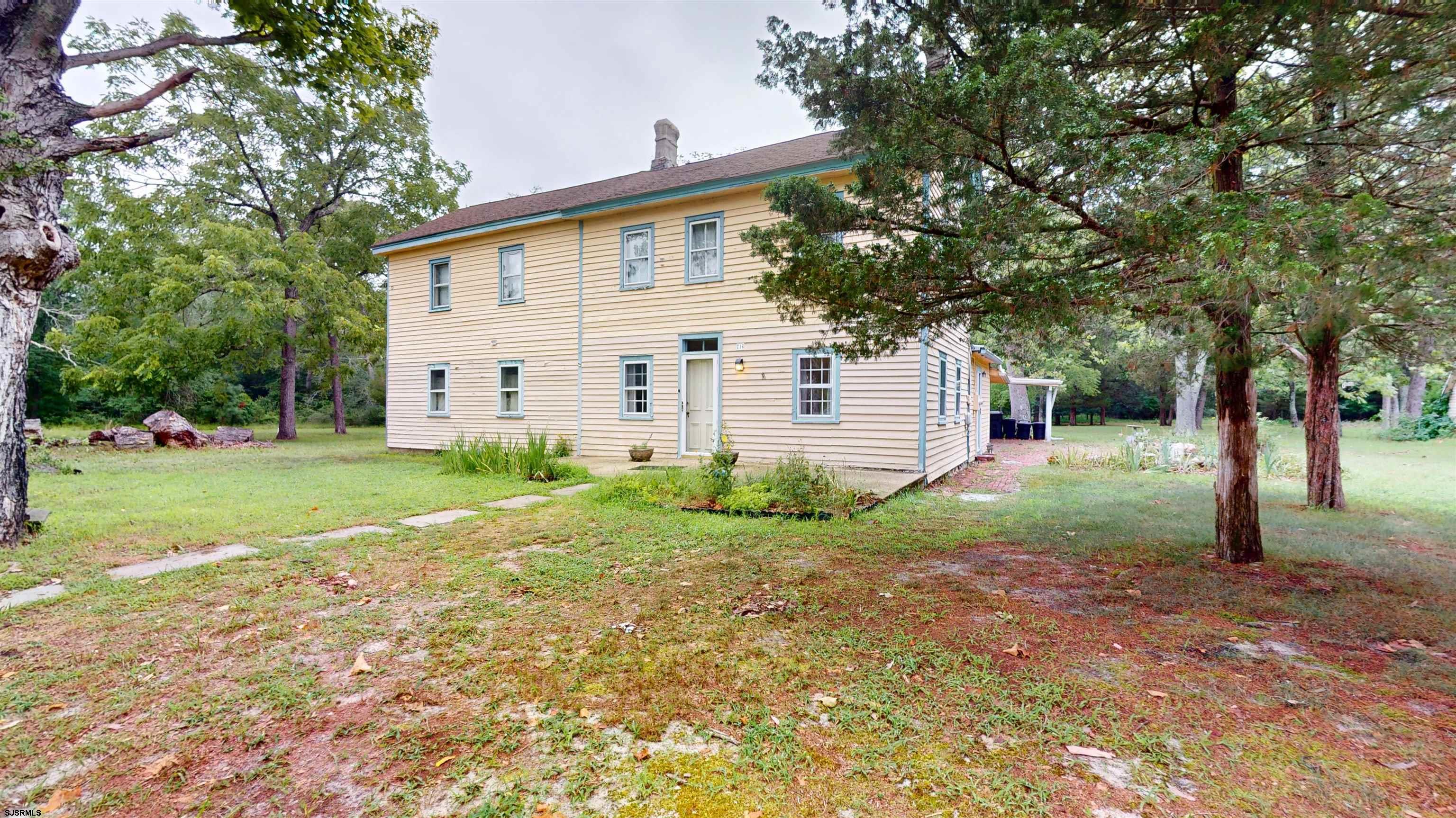 216 Old New York Road Port Republic, NJ 08241 - Photo 4 of 70 a view of a house with yard and a tree