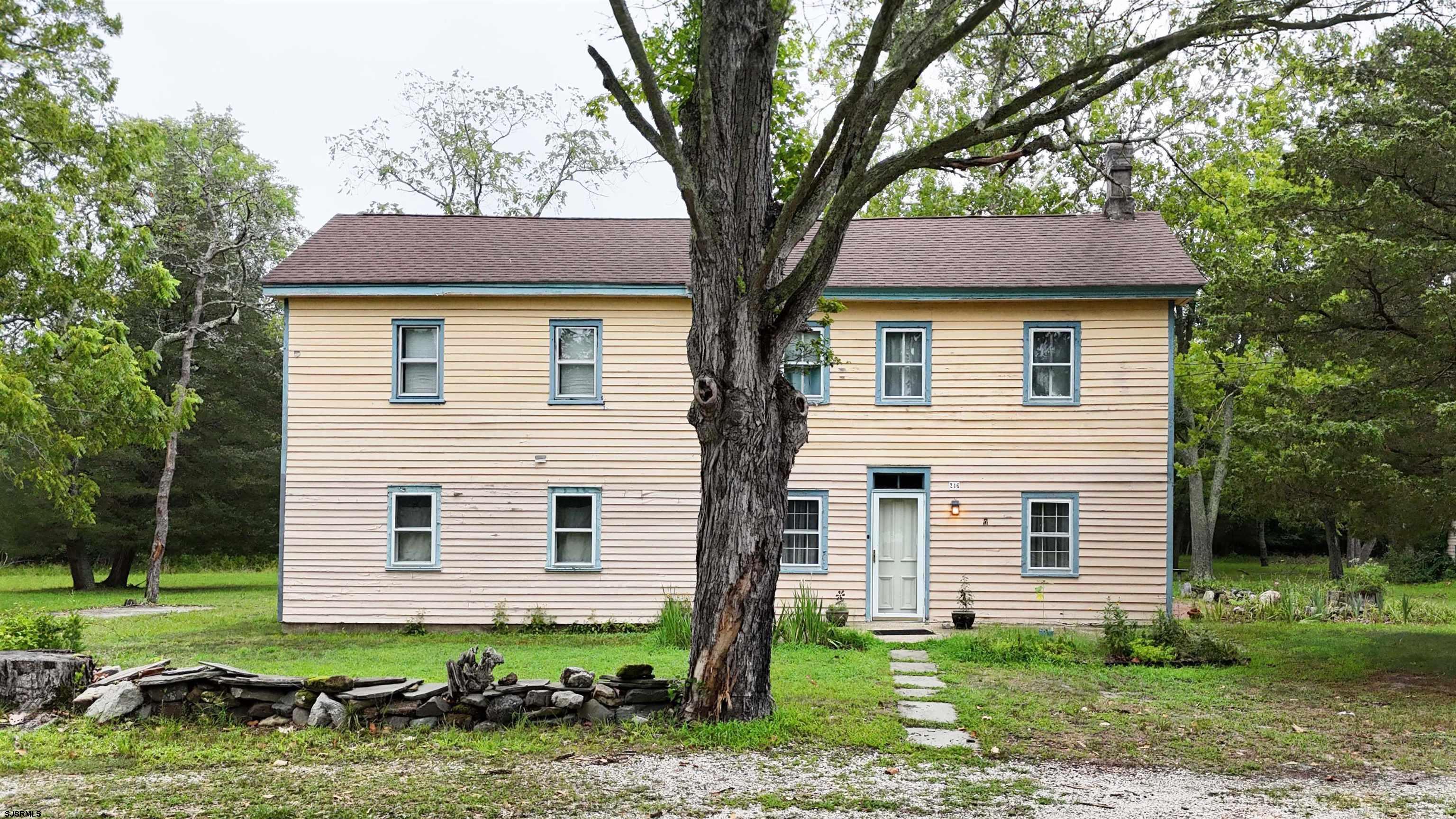 216 Old New York Road Port Republic, NJ 08241 - Photo 50 of 70 a front view of a house with a yard