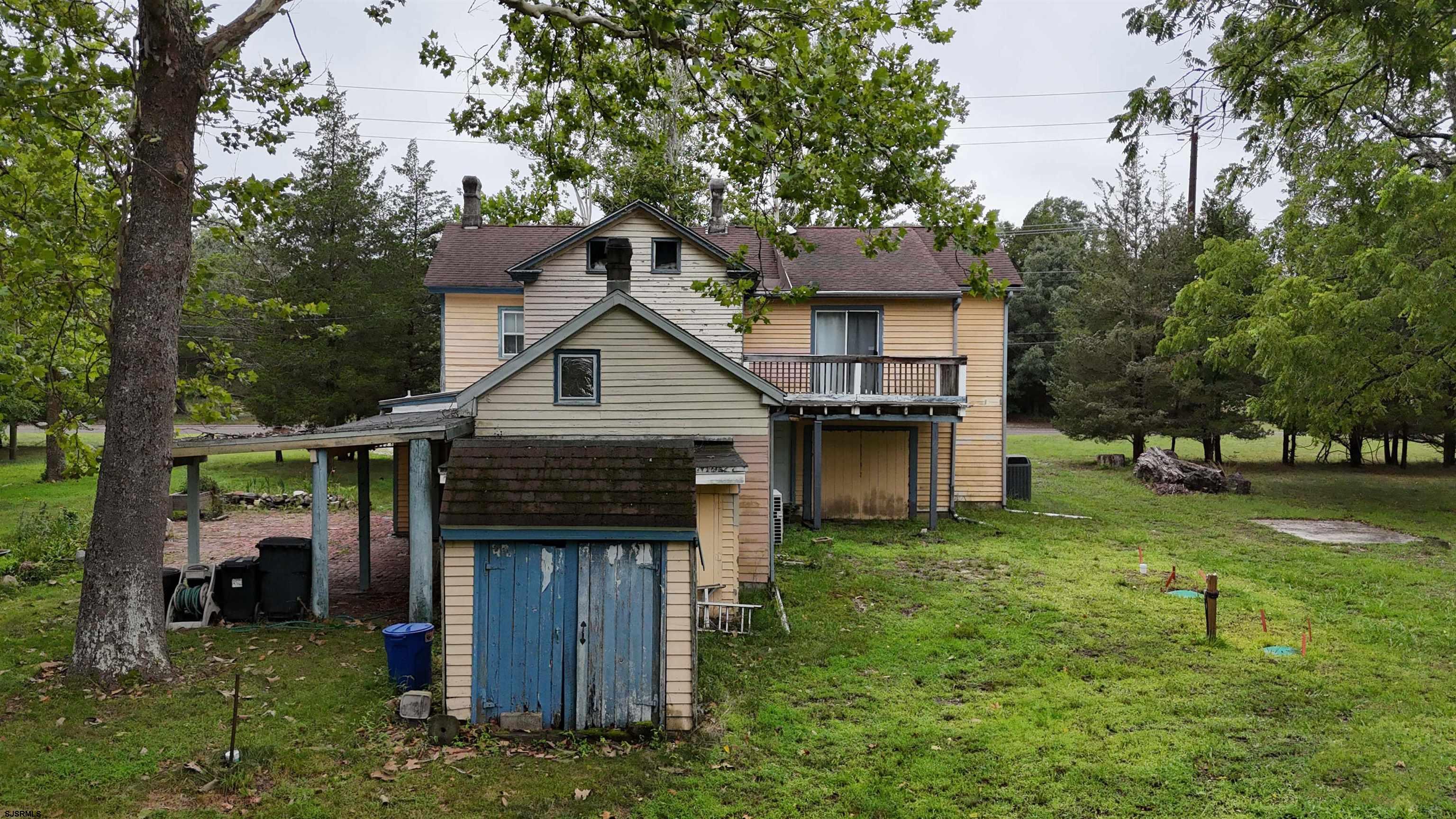 216 Old New York Road Port Republic, NJ 08241 - Photo 55 of 70 a front view of a house with a yard
