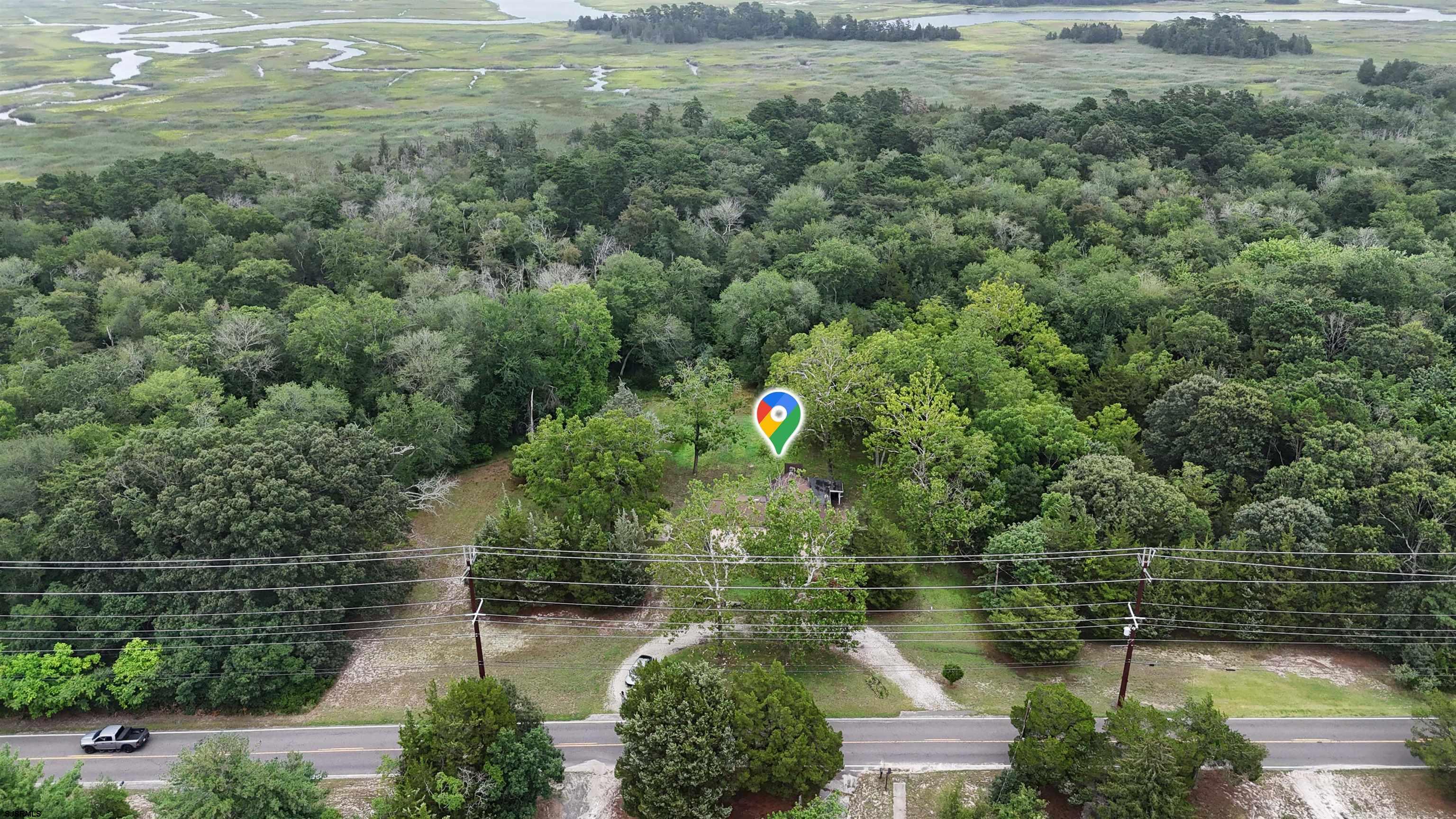 216 Old New York Road Port Republic, NJ 08241 - Photo 64 of 70 an aerial view of residential houses with outdoor space and lake view