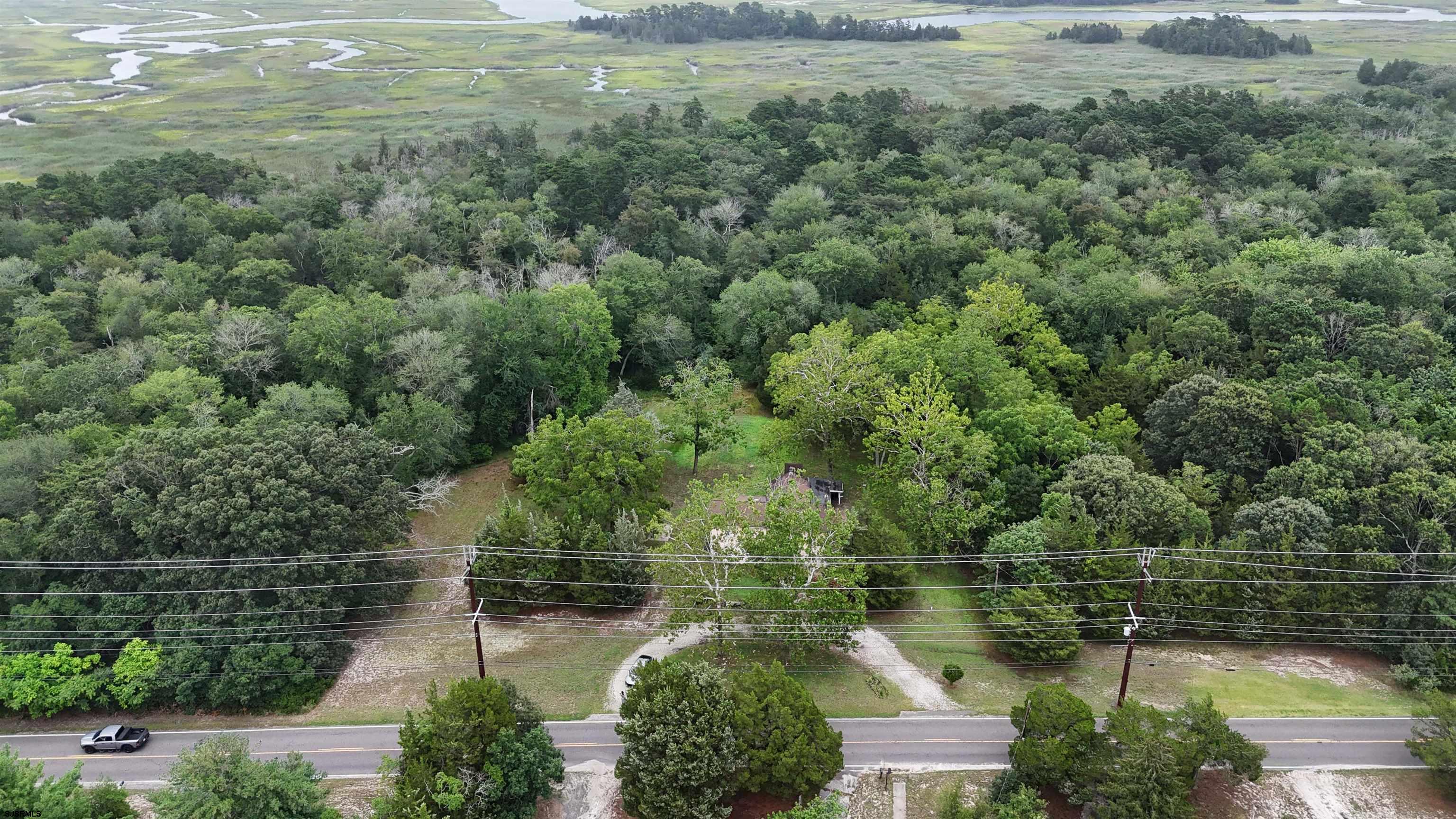 216 Old New York Road Port Republic, NJ 08241 - Photo 70 of 70 an aerial view of residential houses with outdoor space and lake view