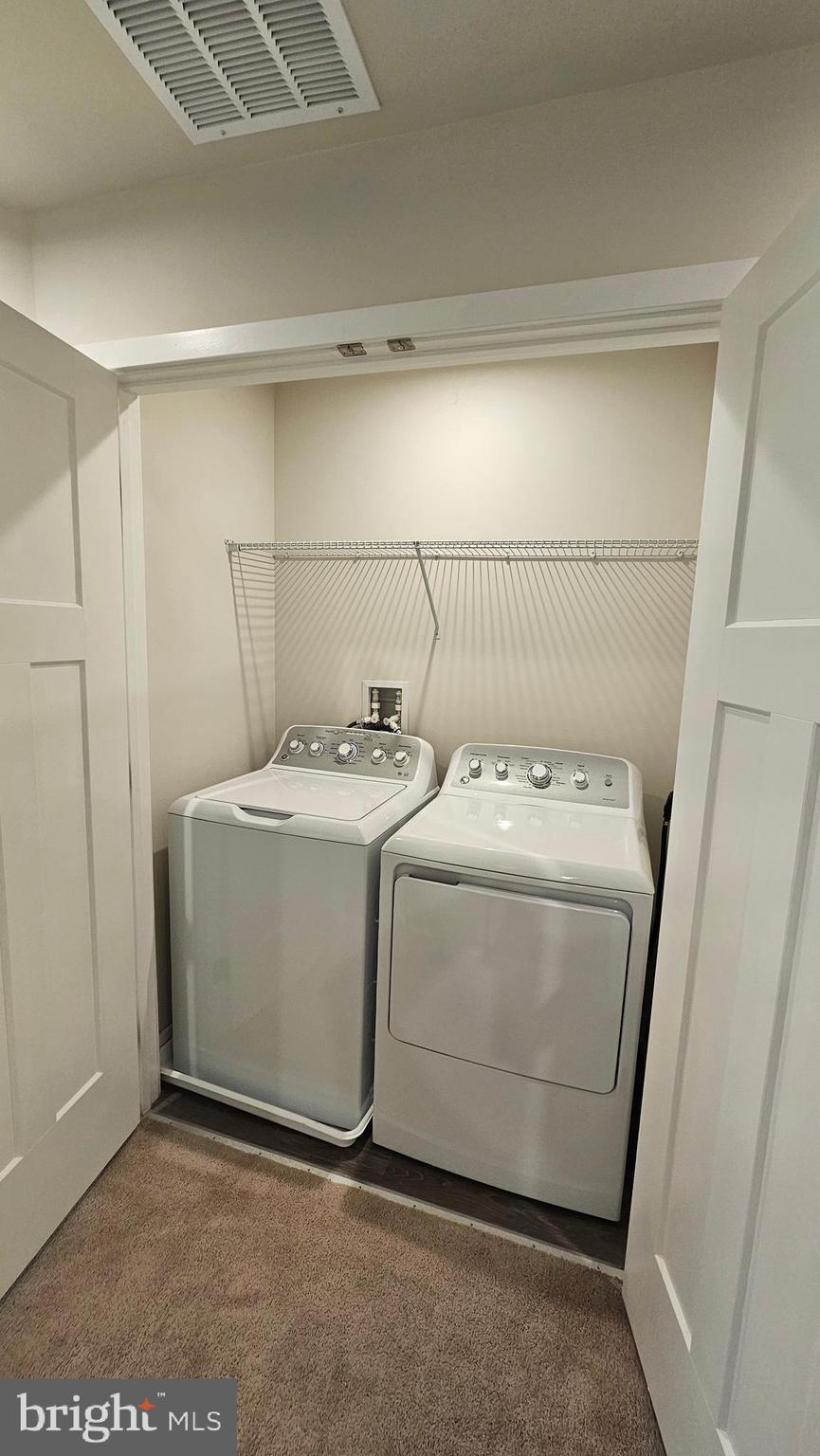 2055 Rivers Drive Newark, DE 19702 - Photo 48 of 48 a utility room with dryer and washer