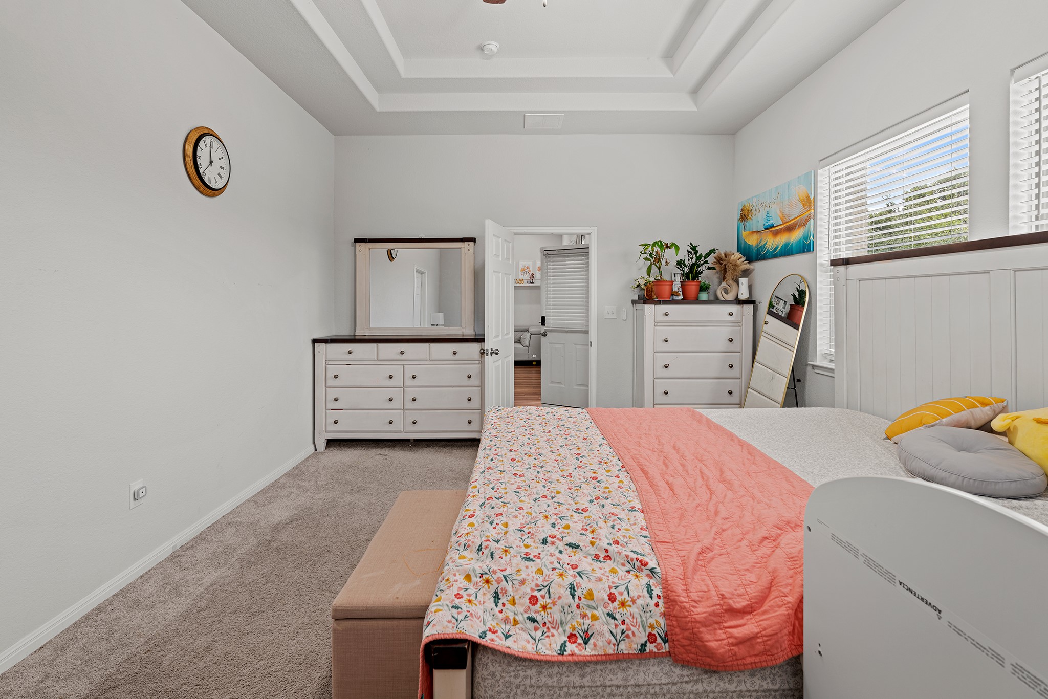 133 Caney Cove Leander, TX 78641 - Photo 10 of 30 Carpeted bedroom with visible vents, baseboards, and a raised ceiling