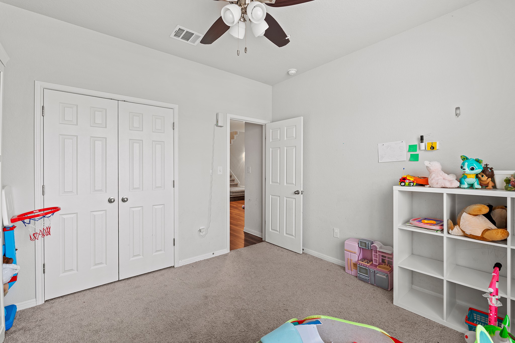 133 Caney Cove Leander, TX 78641 - Photo 12 of 30 Rec room featuring carpet, visible vents, ceiling fan, and baseboards