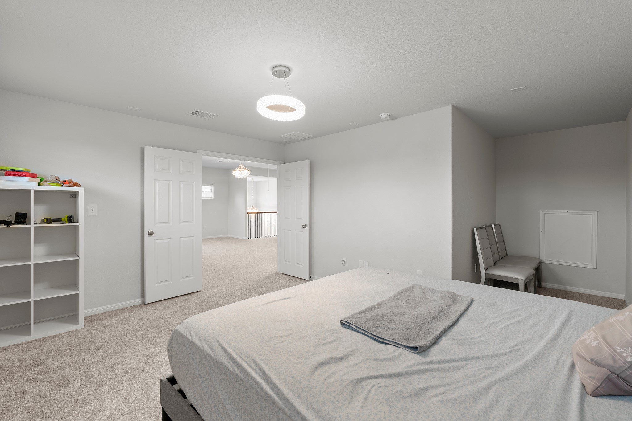 133 Caney Cove Leander, TX 78641 - Photo 18 of 30 Bedroom with baseboards, visible vents, and light colored carpet