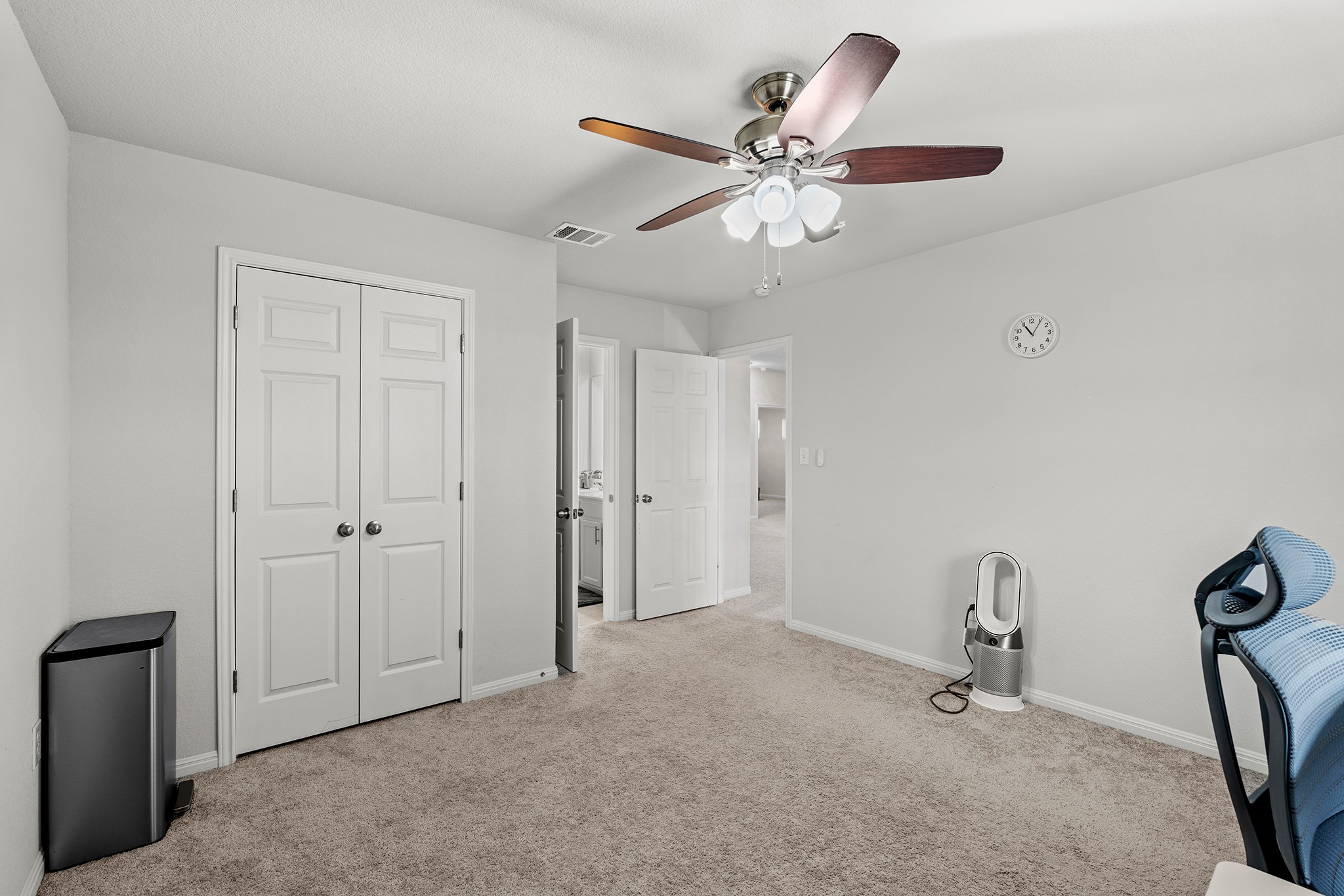 133 Caney Cove Leander, TX 78641 - Photo 20 of 30 Unfurnished bedroom featuring carpet floors, baseboards, visible vents, and a closet